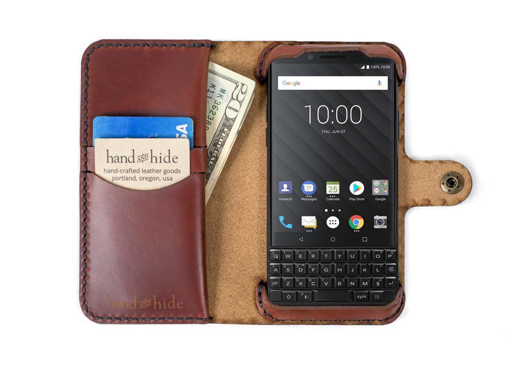 a wallet with a cell phone inside of it