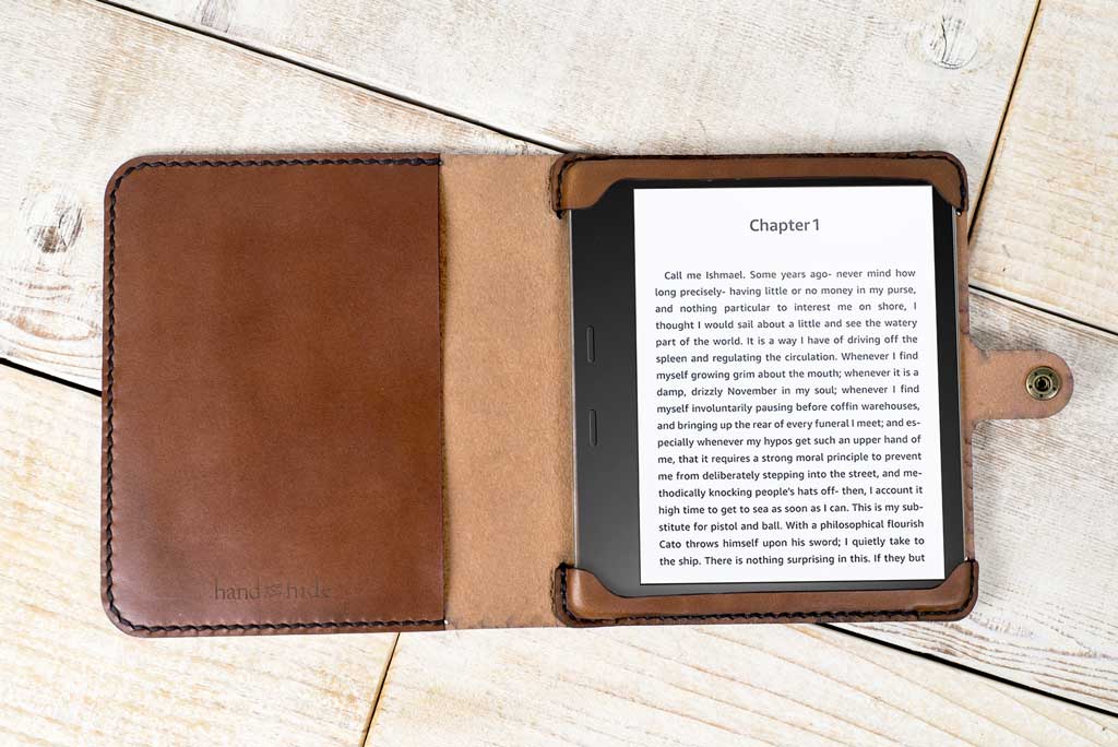 a kindle case sitting on top of a wooden table